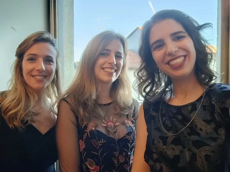 Ana Sofia Matos, Maria Isabel Mendonça and Catarina Gonçalves smiling outdoors